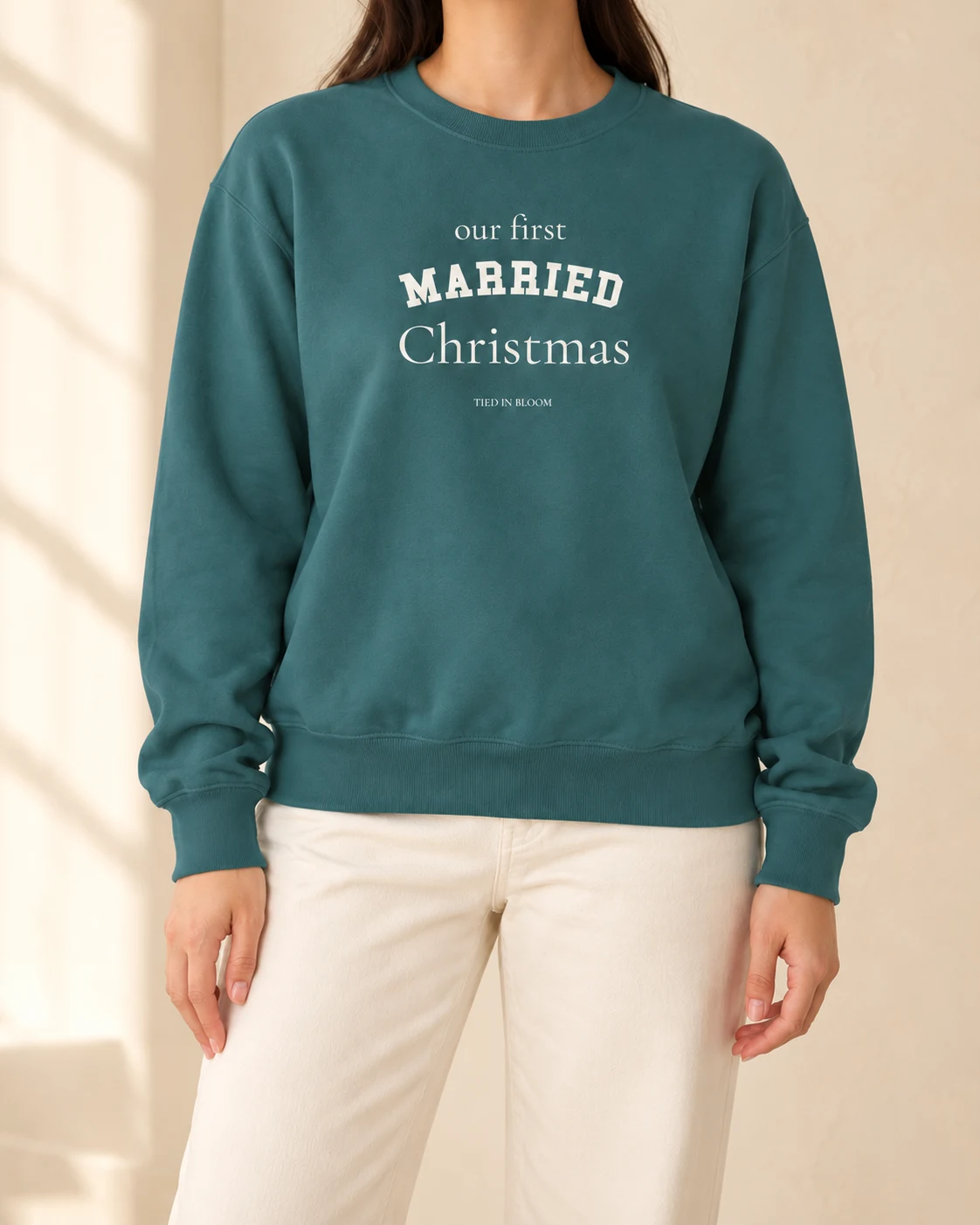 AI mockup of a woman wearing Our First Married Christmas in Blue Spruce, cropped below the face.