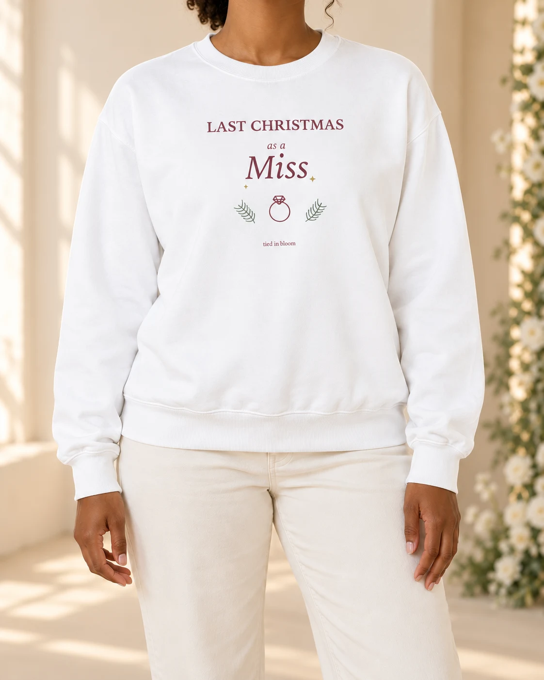 AI mockup of a woman wearing Last Christmas as a Miss in White, cropped below the face.