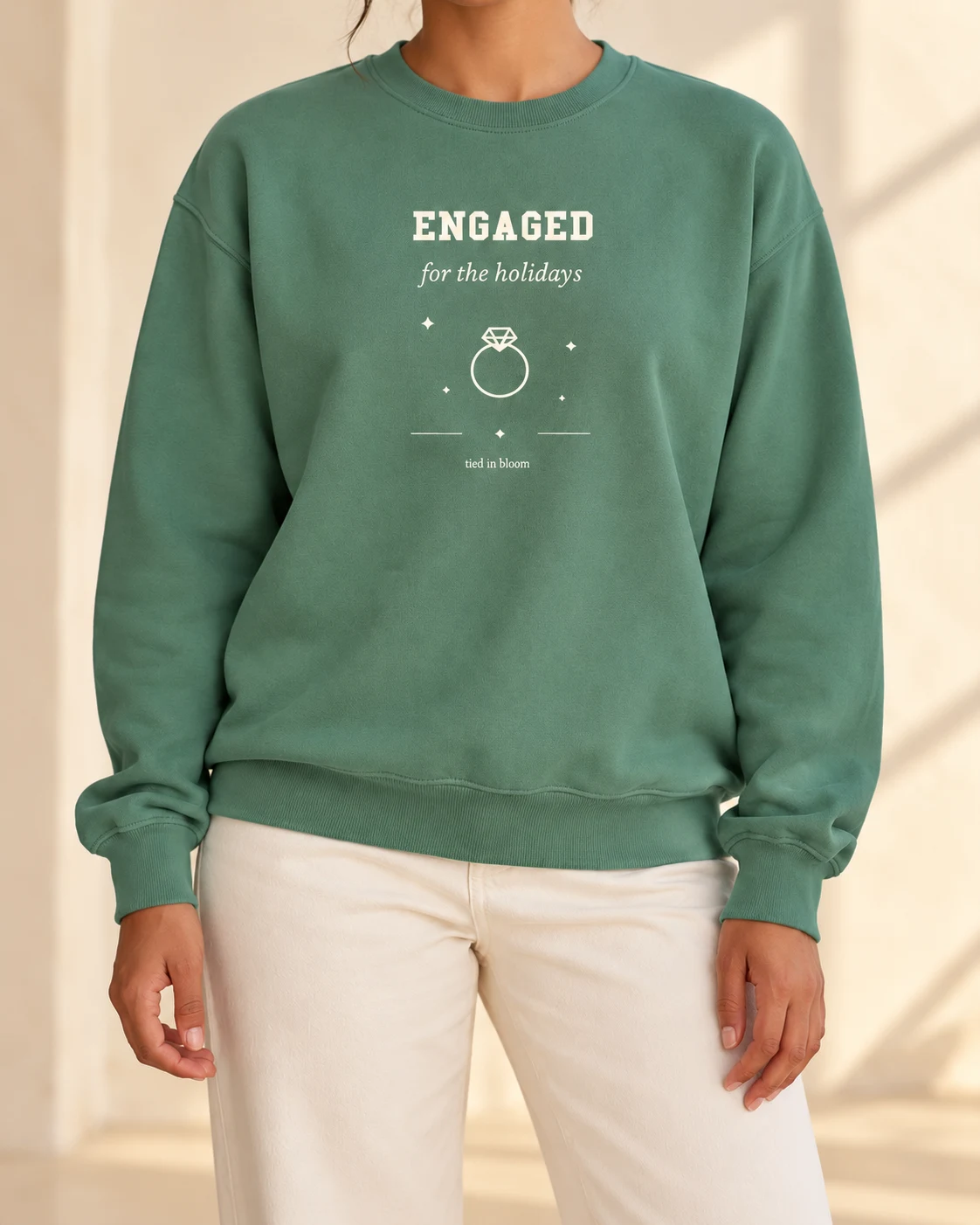AI mockup of a woman wearing Engaged for the Holidays in Light Green, cropped below the face.