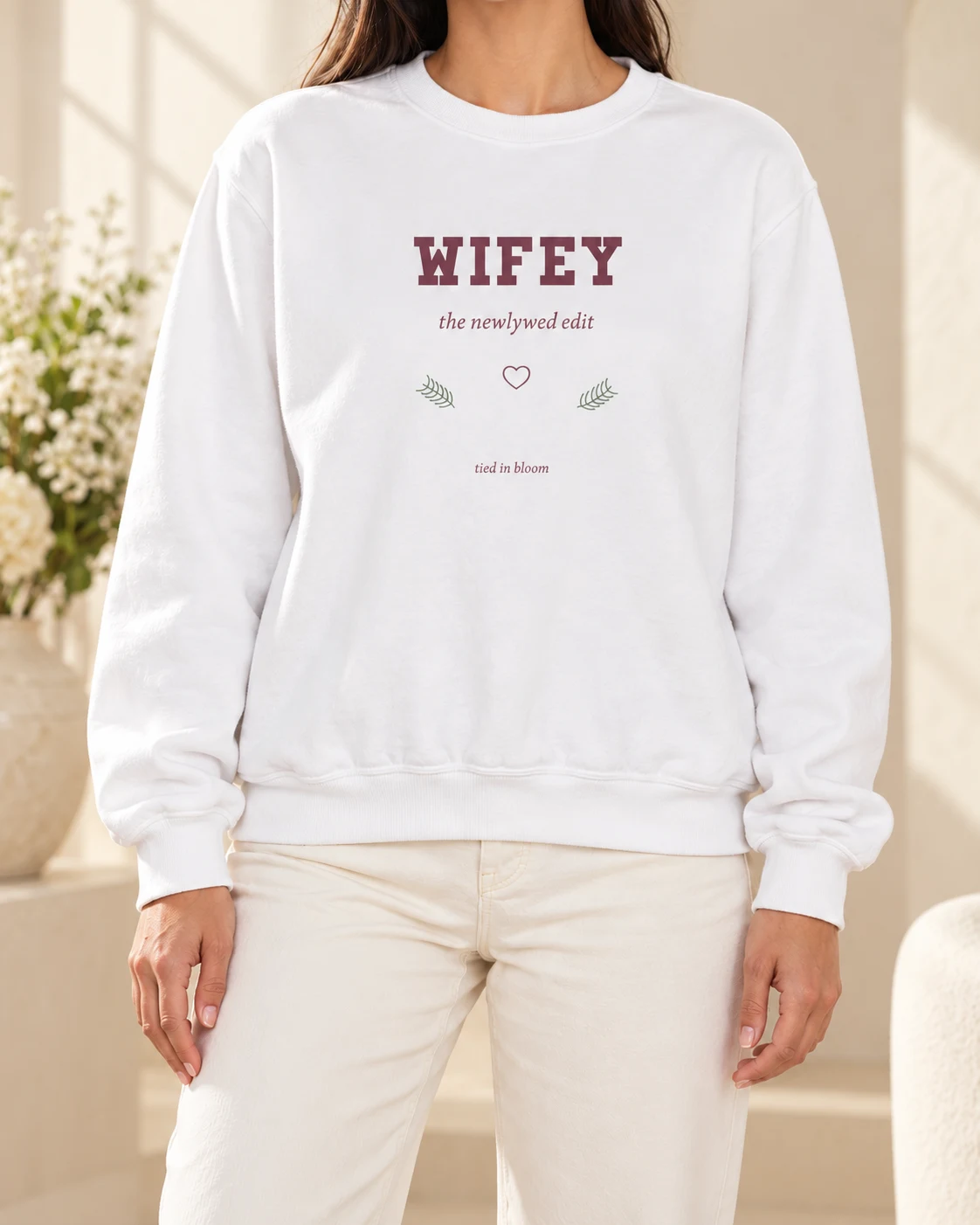AI mockup of a woman wearing Wifey Everyday Club in White, cropped below the face.