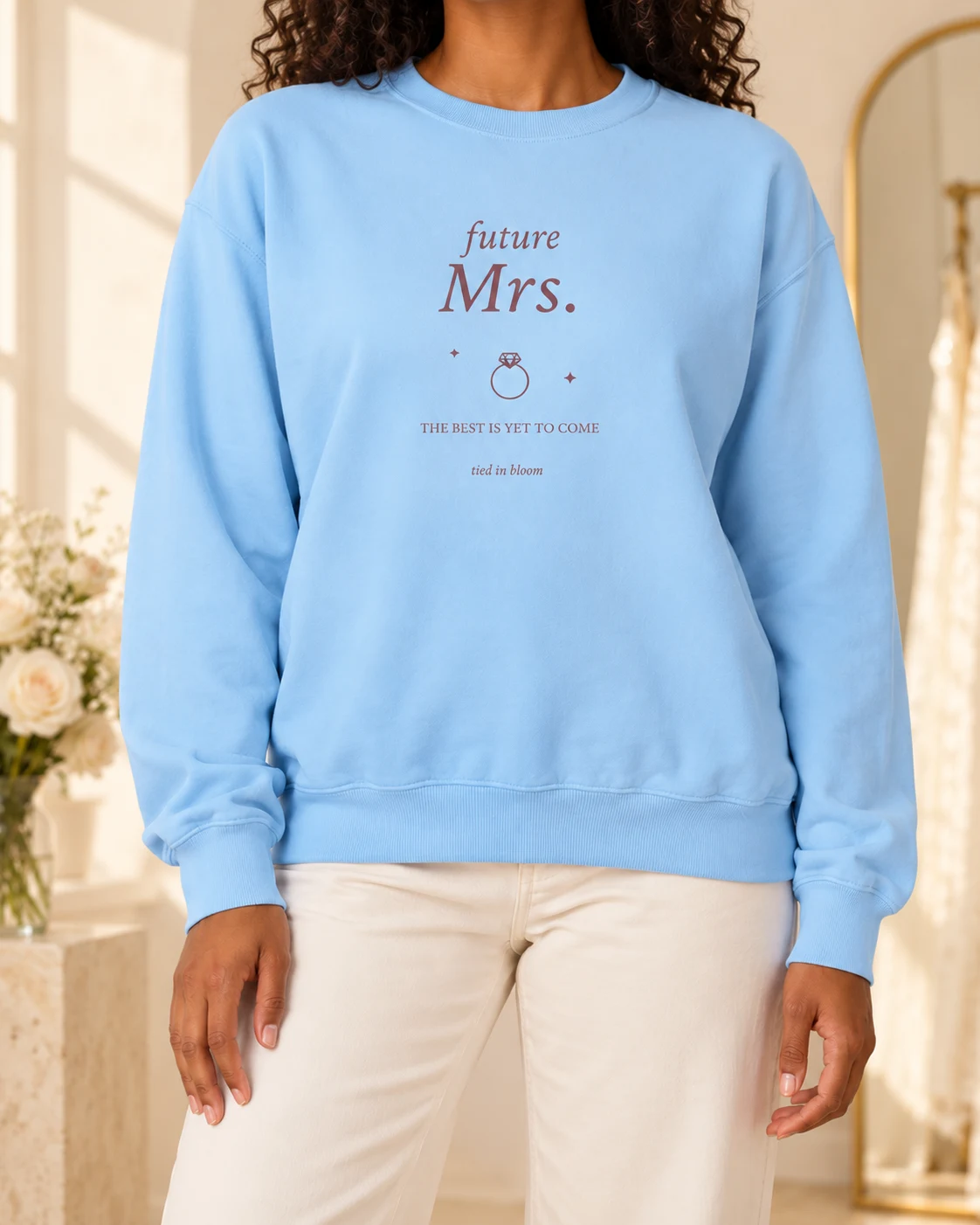 AI mockup of a woman wearing Future Mrs Keepsake in Chambray, cropped below the face.